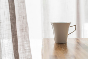 a coffee cup on the table