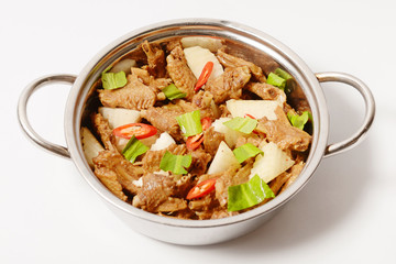 Hot pot stew of chopped duck with radish and herbs