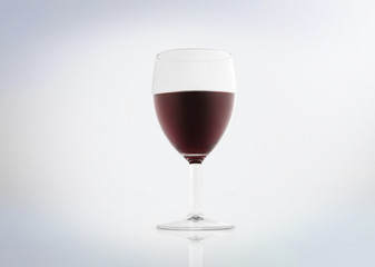 Red wine in a glass isolated on white background.