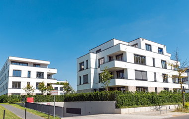 White modern multi-family houses seen in Berlin, Germany