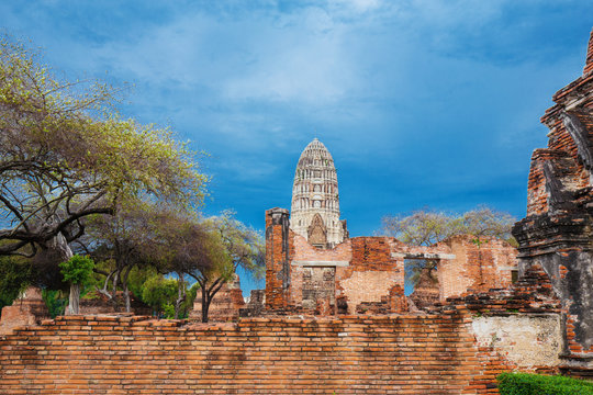 Ruins of buddha statues and pagoda of Wat Ratcha Burana in Ayutthaya historical park, Thailand