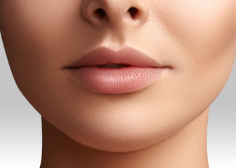Beauty shot for spa salon. Close-up portrait beauty woman. Natural lip closep. Sexy and full lips. Clean skin