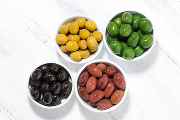 assortment of different kinds of organic olives, top view