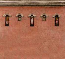 A building with arched windows and a chimney