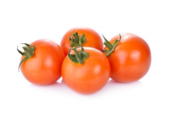 whole fresh tomato on white background