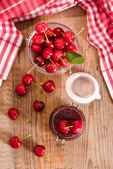 Ripe cherries on wooden table