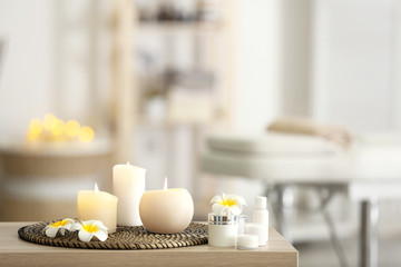 Fototapeta na wymiar Beautiful spa composition on table in modern wellness center