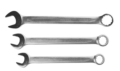Combination wrenches on white background