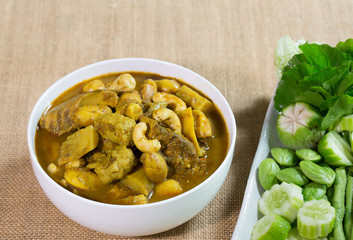Fish paunch spicy curry and hot with fresh vegetable, (Thai food, and thai language 
