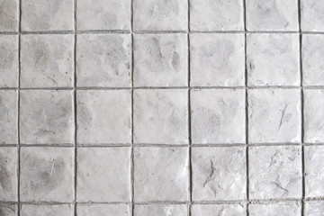 Square stone texture tiles background.