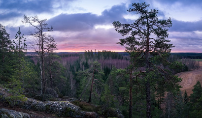 Scenic landscape with sunrise at top of the hill in Finland
