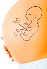 Beautiful woman with baby painted on pregnant belly 