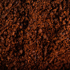 Ground Coffee with Roasted Coffee Beans , copyspace.  Espresso Texture macro