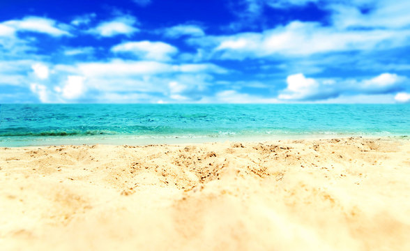 Sand Beach and blue sea  - Tropical Holiday Background.
