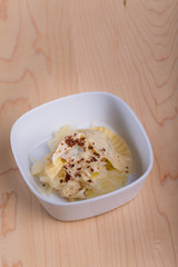 Ravioli with stuffing and crumble