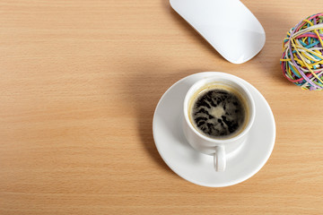 Desktop. Break. A cup of coffee. Computer mouse