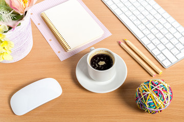 working place at wooden desktop with coffee