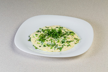 Scrambled eggs with greens