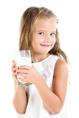 Smiling little girl drinking milk isolated