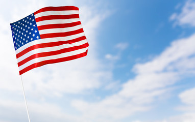 Obraz premium American flag against blue sky