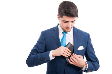 Salesman pulled out his inside jacket pocket wallet