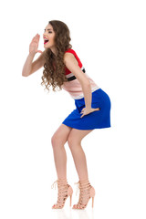 Shouting Young Woman In Mini Dress And High Heels