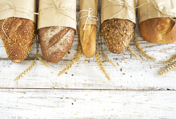 Freshly baked bread on wooden table
