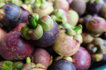 Mangosteen the queen of fruits Delicious. mangosteen fruit arranged on a basket.