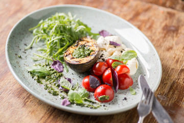 Italian appetizer with avocado and mozzarella