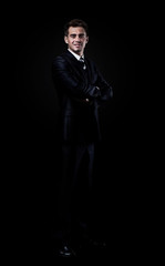 Fototapeta na wymiar businessman isolated over black background