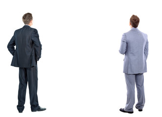 two business mans from the back - looking at something over a white background - Powered by Adobe