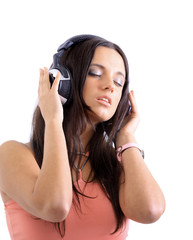 attractive girl with headphones on white background