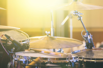 Professional drum set on the stage in the indoor concert hall event