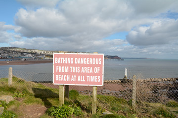 Bathing Dangerous from this Area at all times sign in Shaldon Devon England