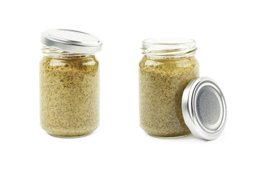 Glass jar of italian pesto isolated