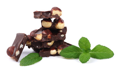 chocolate candies sweets with hazelnut and mint isolated on white background