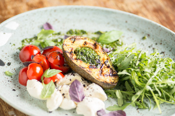 Italian breakfast with avocado and mozzarella
