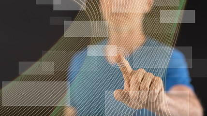 Fototapeta na wymiar Man touching a virtual technology concept on a touch screen