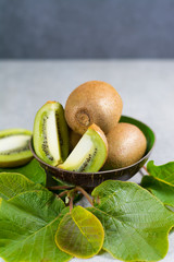 Tropical ripe organic kiwi fruit with leaves ready to eat