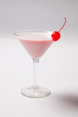 Classic pink lady cocktail on white background
