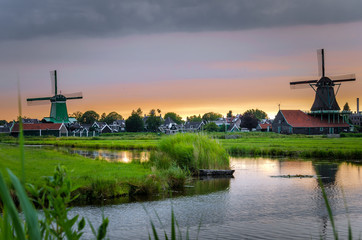 Sunset over Historic Windmills at Zaanse Schans in the Netherlands