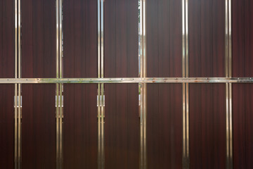 Wrought stainless steel and wood fence