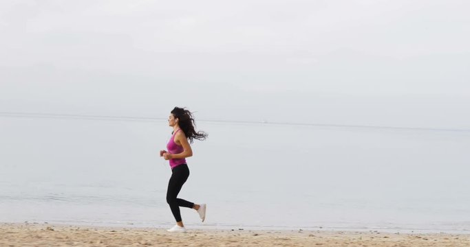 Running Girl Runner Woman Training Outdoors Exercising On Beach, Young Female Jogging Alone On Seaside Slow Motion 60