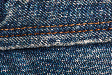 closeup texture thread and stitch denim pants