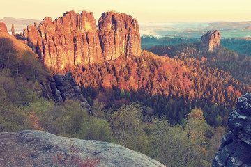 Misty valley, sharp rocks gentle cut creamy fog to strips. Long deep valley full of fresh spring mis © rdonar