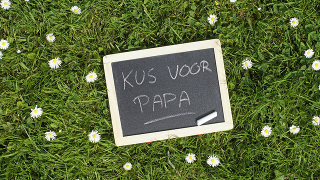 Kiss from dad written in Dutch