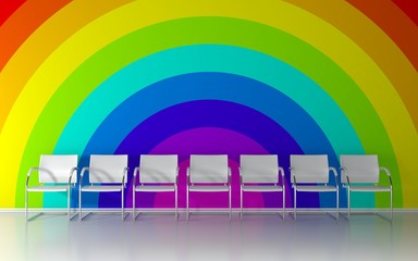 Nice waiting room with white chairs and rainbow colors on the wall