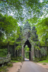 Scenic jungle view of the Angkor Thom North Gate at the Angkor Temple complex near Siem Reap, Cambodia