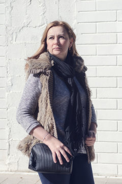 Blonde woman with serious look