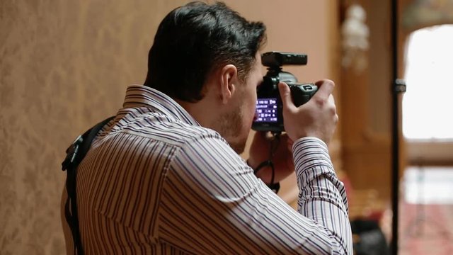 Photographer work with model indoor.